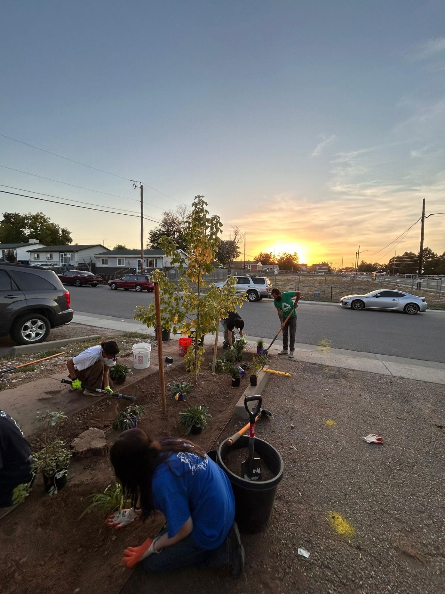 Groundwork Denver team members building a rain garden.