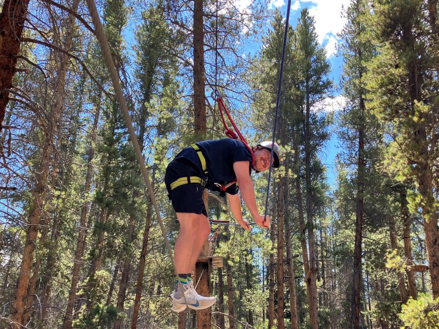 David on the COBS high ropes course. Photo courtesy of Colorado Outward Bound School (COBS).