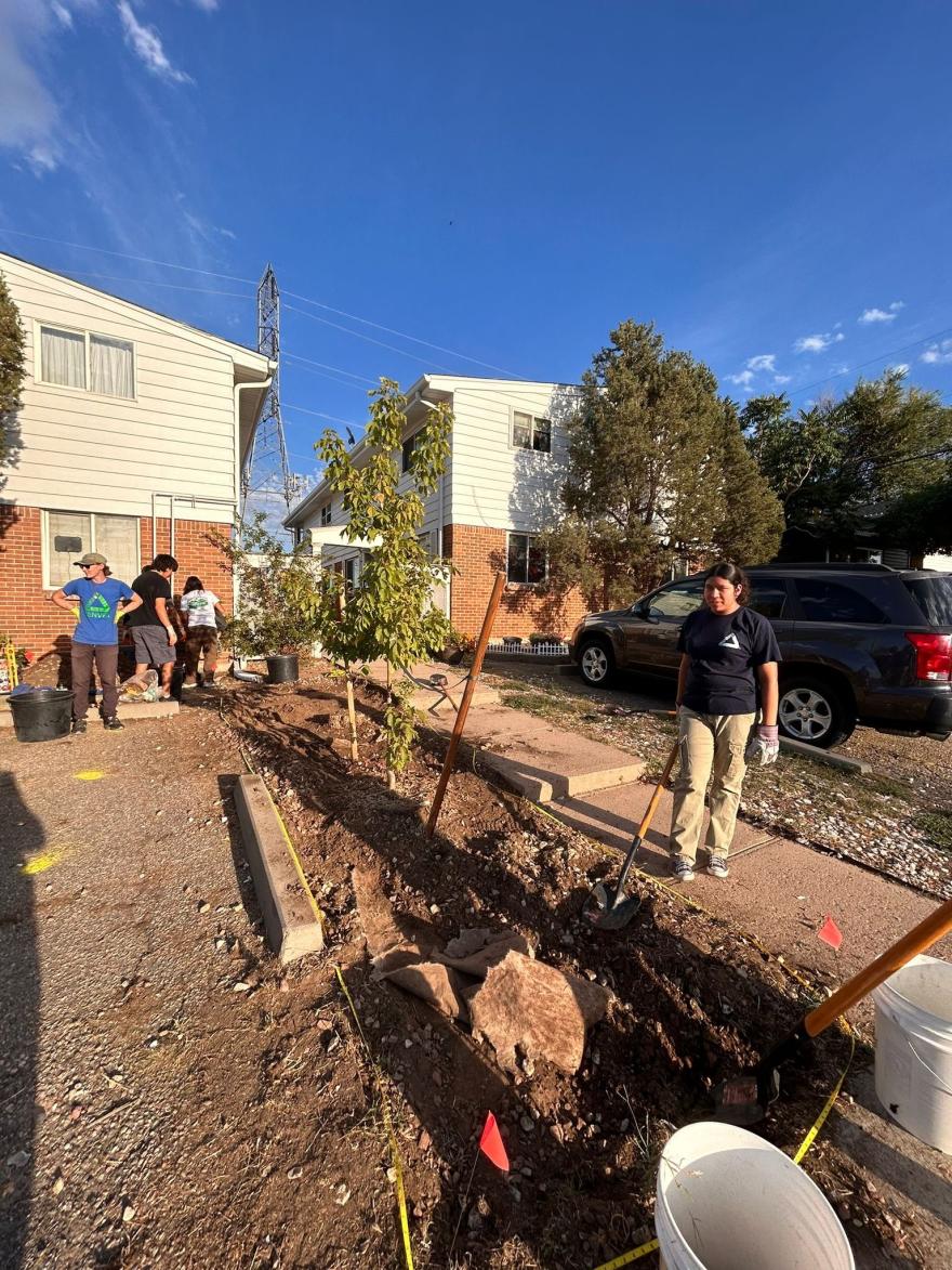 Groundwork Denver team members building a rain garden.